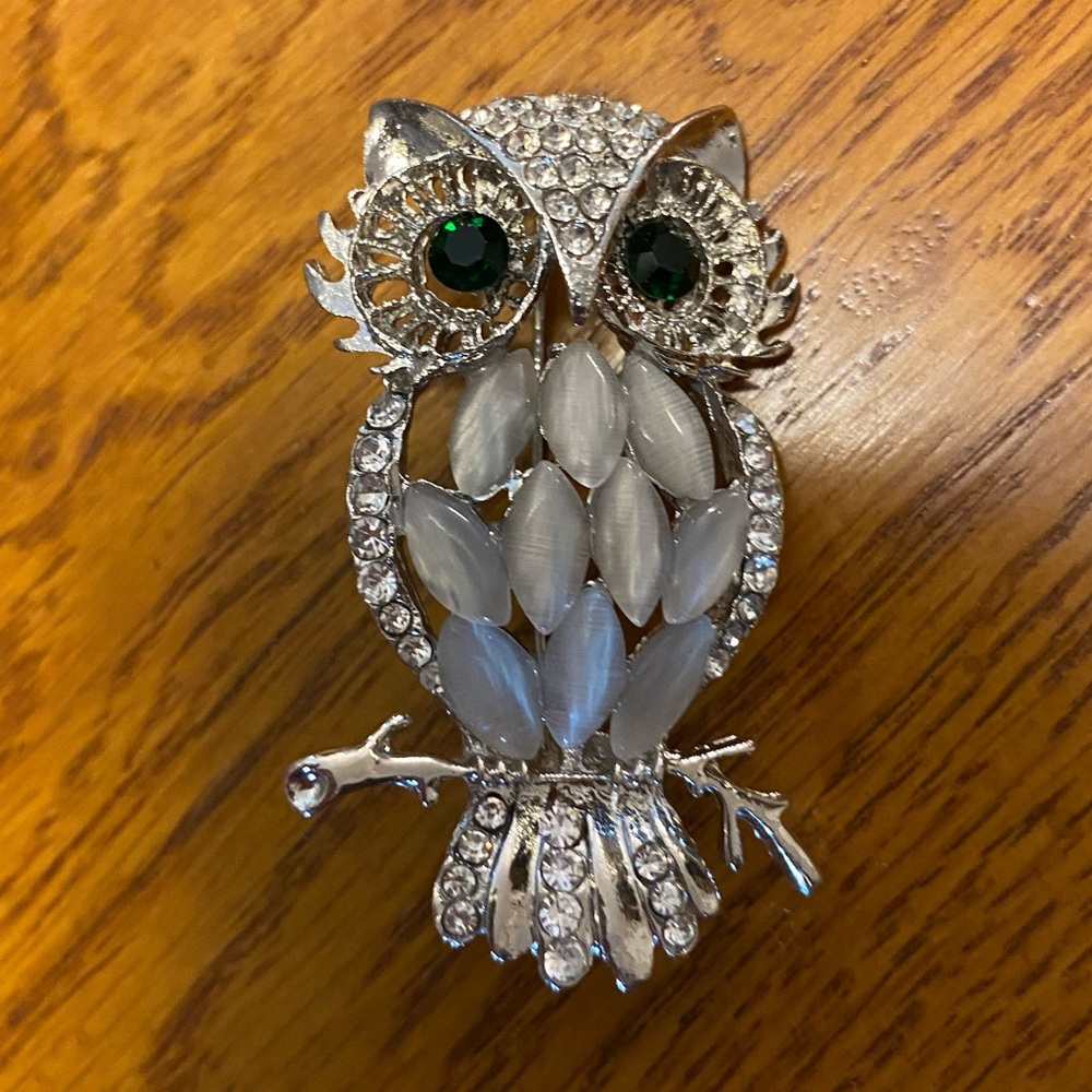Stunning multiple gemstone on silver three-dimensional owl brooch. 2” tall.